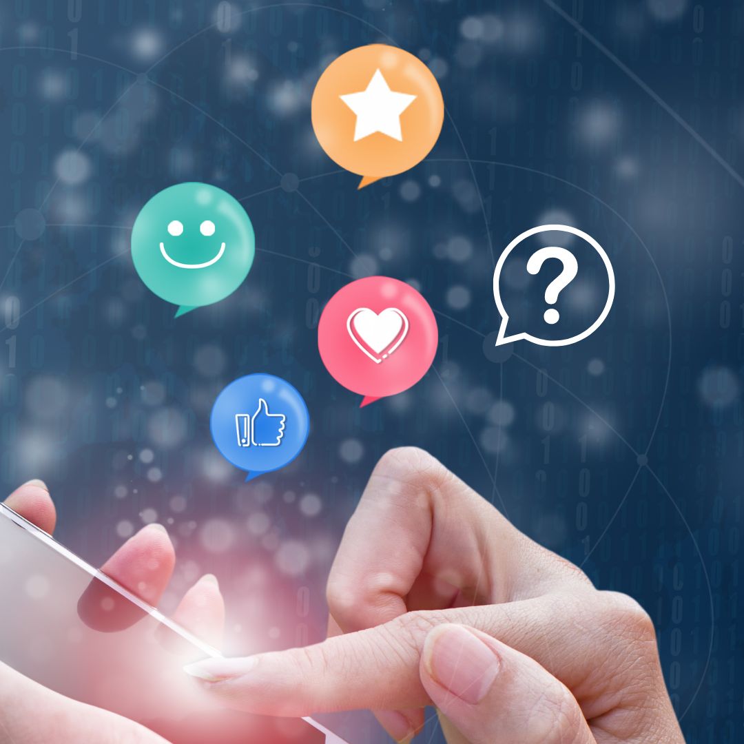 Question-mark, heart, star, smiley face, and thumbs-up bubbles float above a mobile phone to show woman providing feedback.
