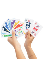 Hands holding new suits and special cards, like Wild, Draw 2, Draw 4, Reverse, and Switch Hands cards along with a blank, make-your-own card
