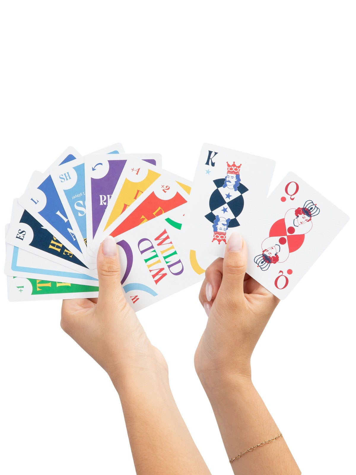 Hands holding new suits and special cards, like Wild, Draw 2, Draw 4, Reverse, and Switch Hands cards along with a blank, make-your-own card